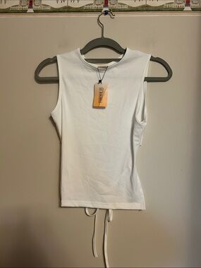 Forever 21 sleeveless top half length back tie across back size 2  new with tag